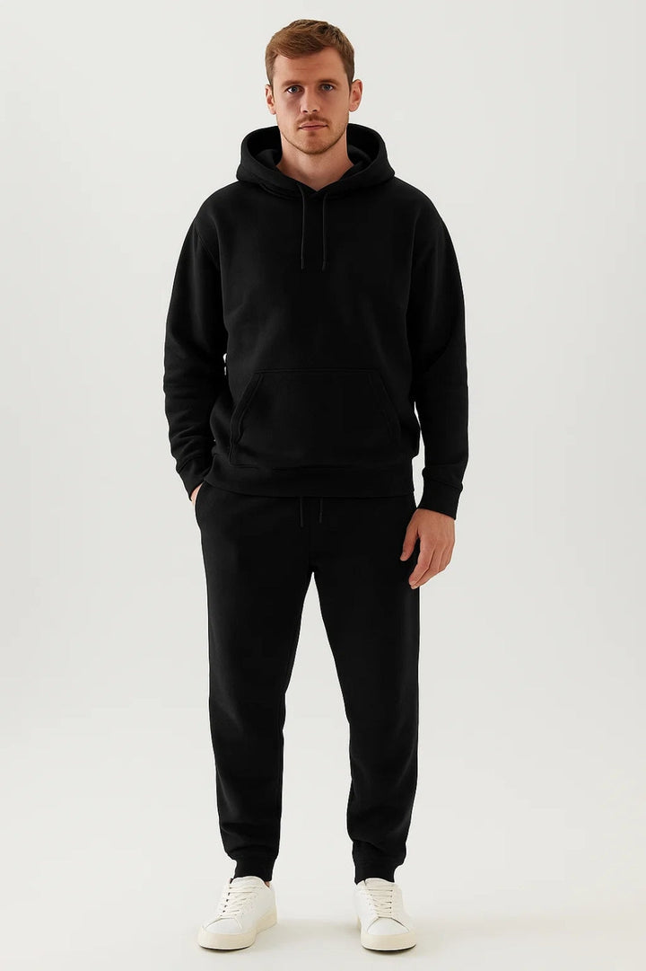 Full view of a men's casual tracksuit set with a hooded sweatshirt and matching comfortable joggers.