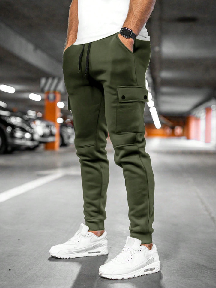 Men's casual utility pants in army green, perfect for travel