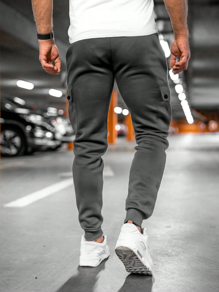 Detail shot of pockets on men's jogger cargo trousers
