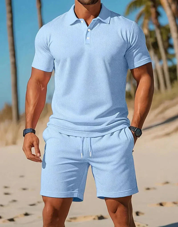Coordinated men's casual knitted polo shirt and matching shorts set for a relaxed summer style. Versatile two-piece.