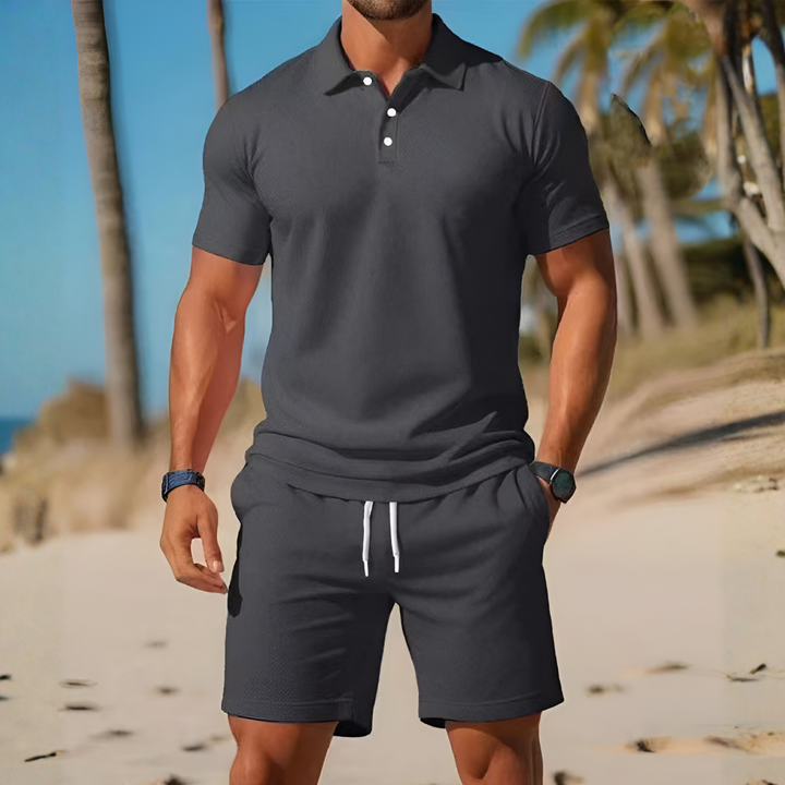 Men's summer two-piece: a knitted polo shirt paired with matching casual shorts. Stylish & comfortable men's fashion.