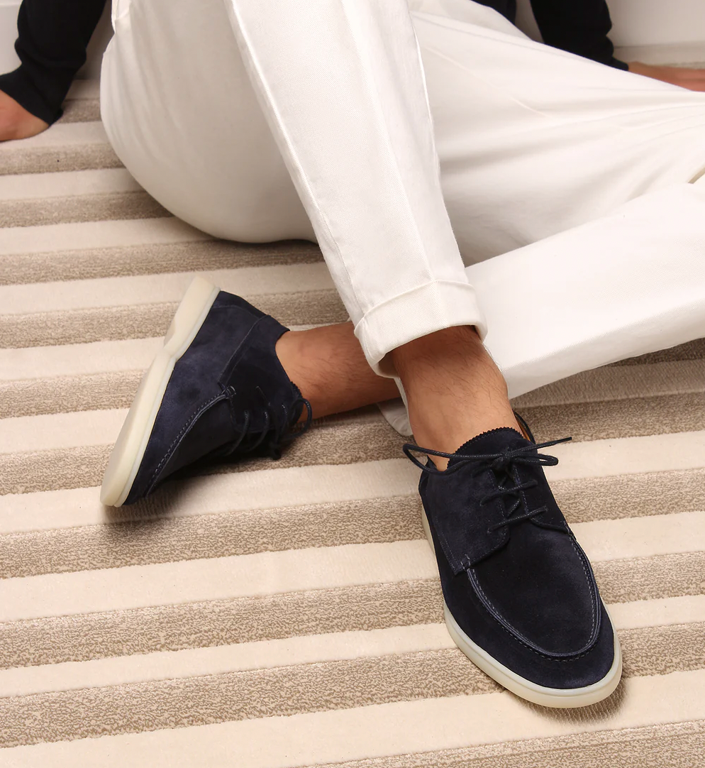 Essential men's lace-up deck shoes, offering timeless boat shoe style and comfort for casual spring & summer wear.