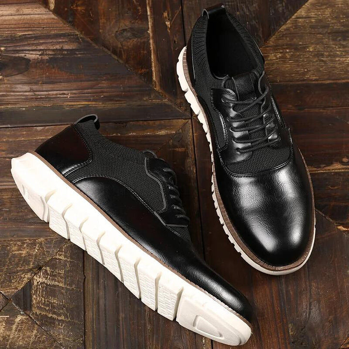 Black men's casual lace-up trainers. Comfortable & stylish everyday footwear with a durable sole.