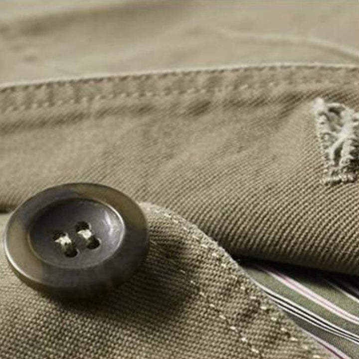 Detail shot of buttons and lapels on a men's versatile casual blazer.