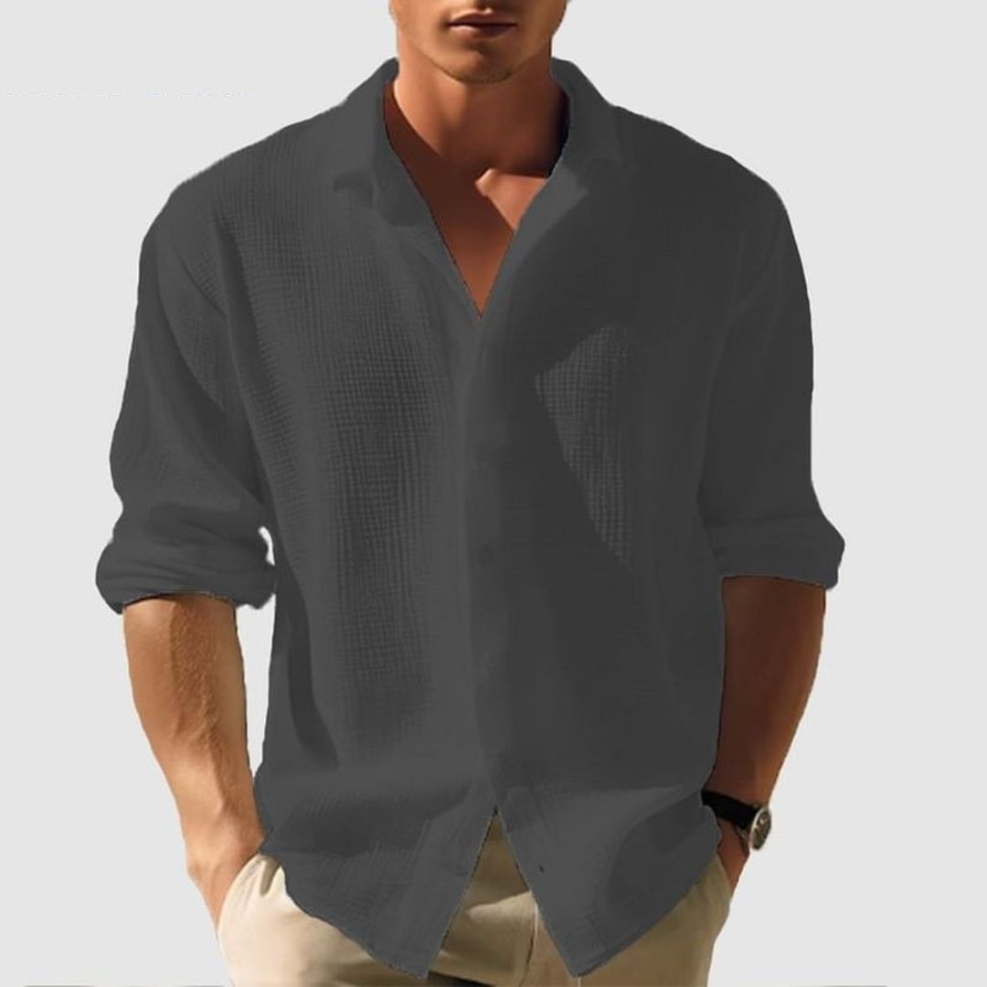 Smart casual men's long sleeve button-down shirt with a waffle texture, ideal for versatile everyday fashion.