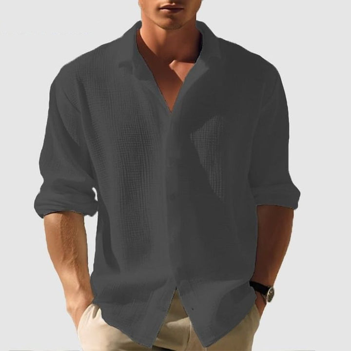 Smart casual men's long sleeve button-down shirt with a waffle texture, ideal for versatile everyday fashion.