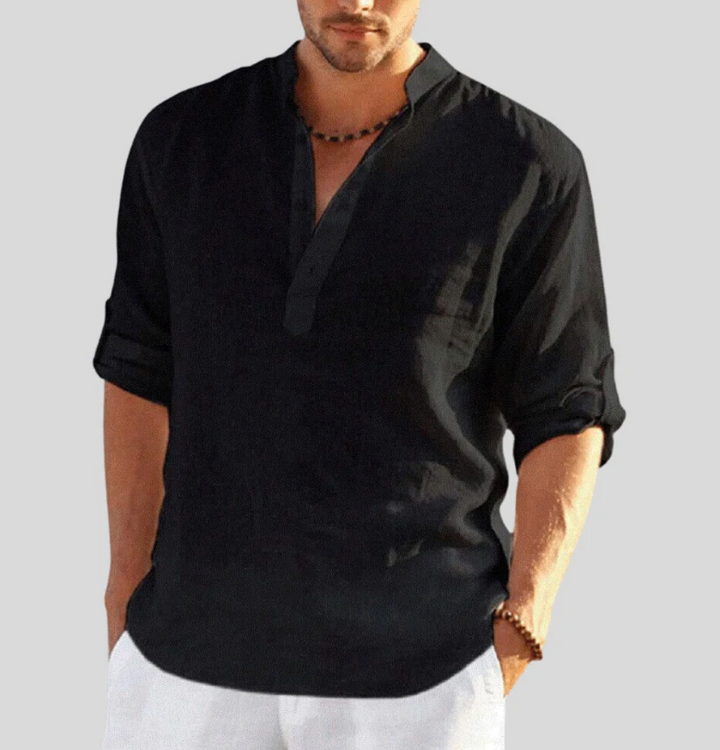 Lightweight men's casual long sleeve summer shirt with button placket, offering relaxed fit & everyday comfort.