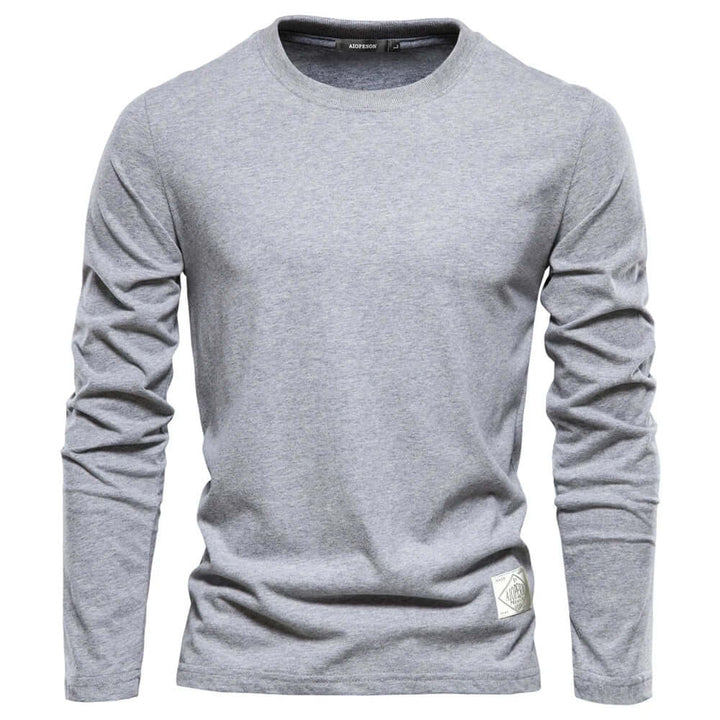 Stylish men's crewneck long sleeve t-shirt, perfect for versatile layering.