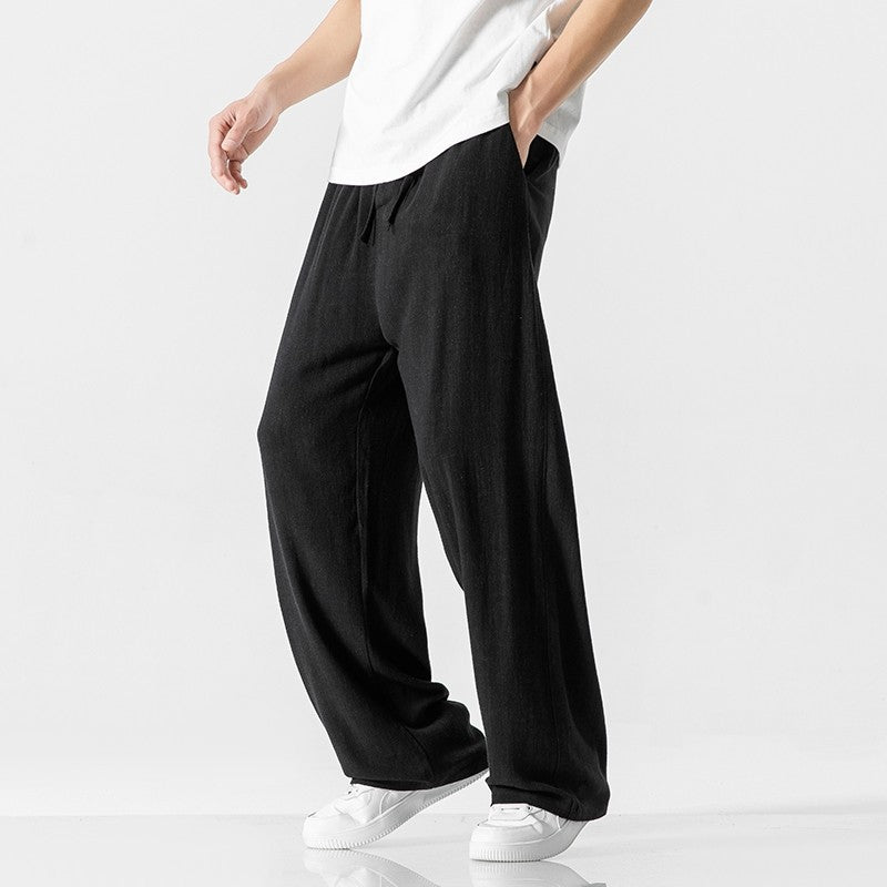 Men's everyday casual pants, full length with a relaxed fit and practical drawstring waist.