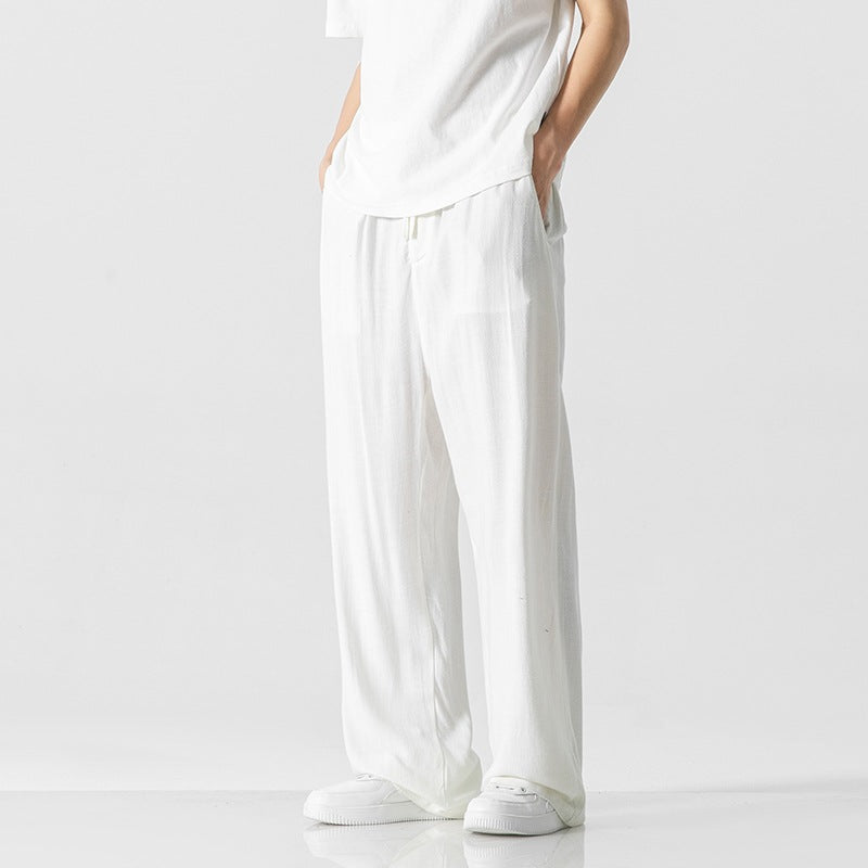 Durable men's casual pants, loose fit, full length, with a comfortable and adjustable drawstring waist.