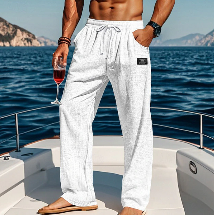 Relaxed men's summer lace trousers, perfect for casual comfort and breathable style in warm weather.