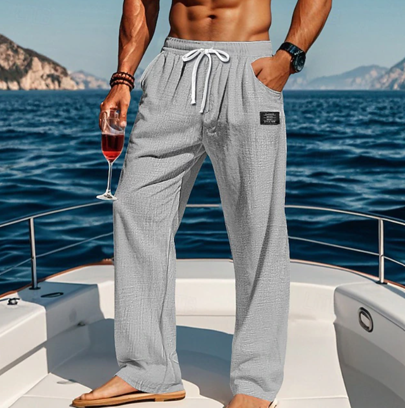 Stylish men's casual loose pants with lace detailing, perfect for summer relaxation and comfort.