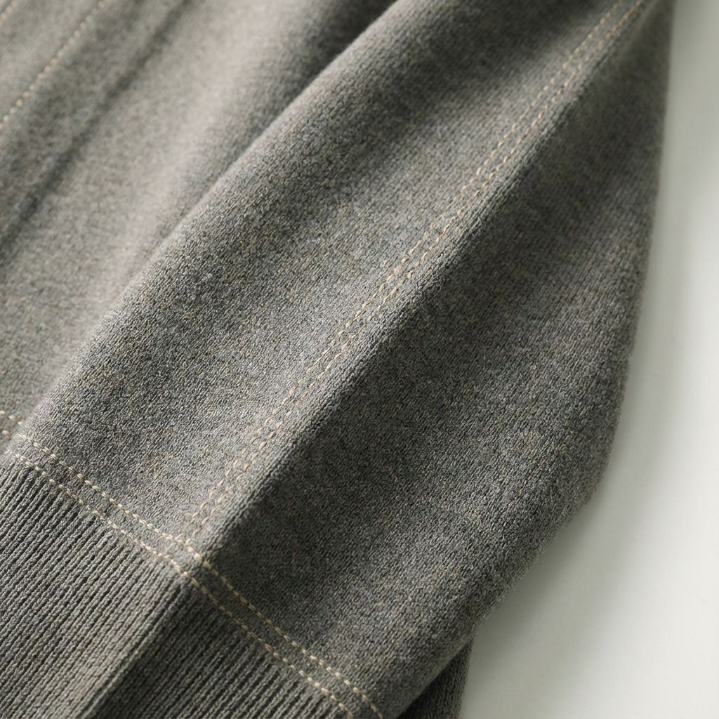 Back view of a men's casual plaid cardigan, showing its relaxed fit and overall design.