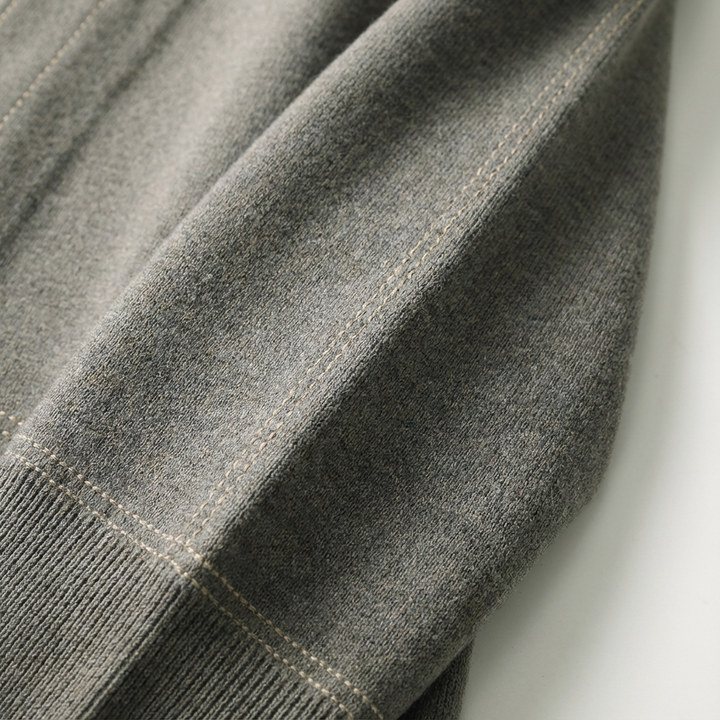 Back view of a men's casual plaid cardigan, showing its relaxed fit and overall design.