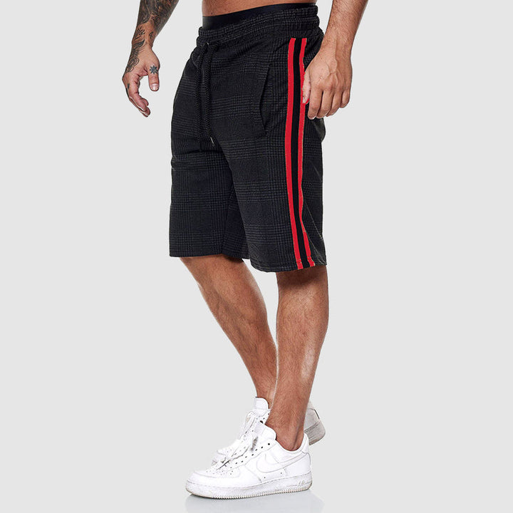 Stylish men's plaid shorts, perfect casual apparel for warm summer days & comfortable relaxation.