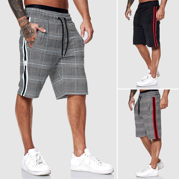 Close-up of men's casual plaid shorts fabric, showing the soft texture & detailed pattern.