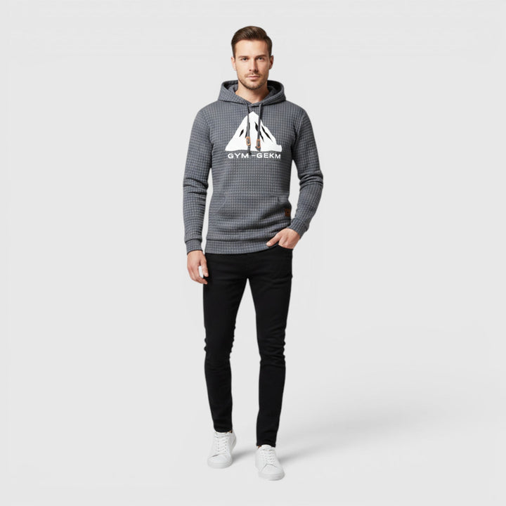 Men's blue pullover hoodie, soft & warm casual loungewear for cold weather.