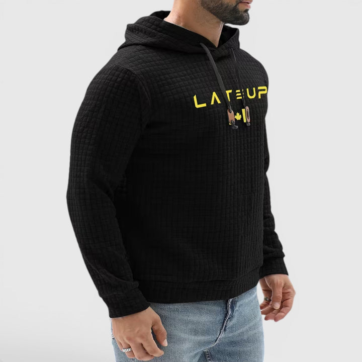 Warm men's casual pullover hoodie, perfect for comfortable winter loungewear.