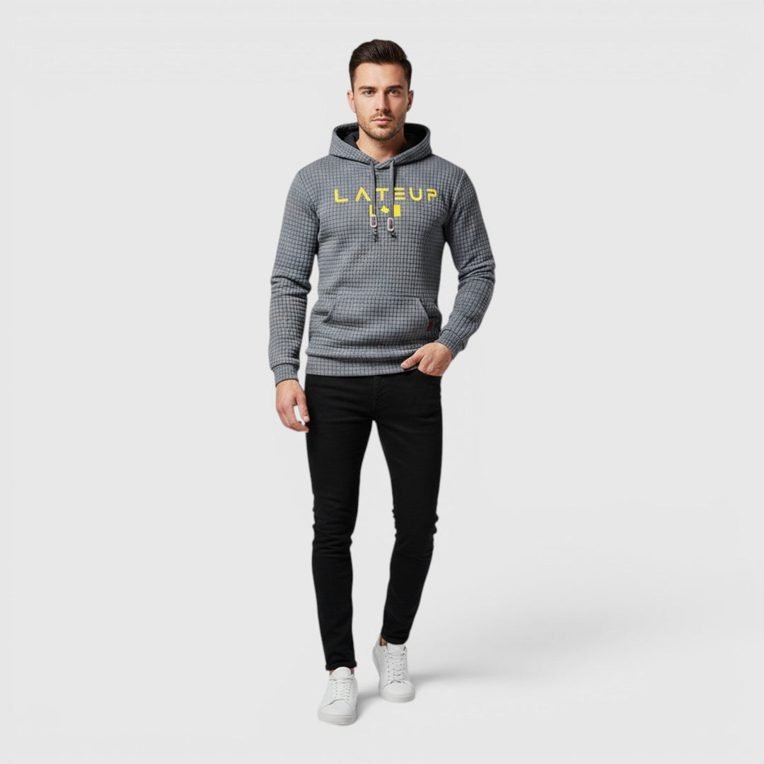 Textured men's casual pullover hoodie, comfortable fall & winter versatile wear.
