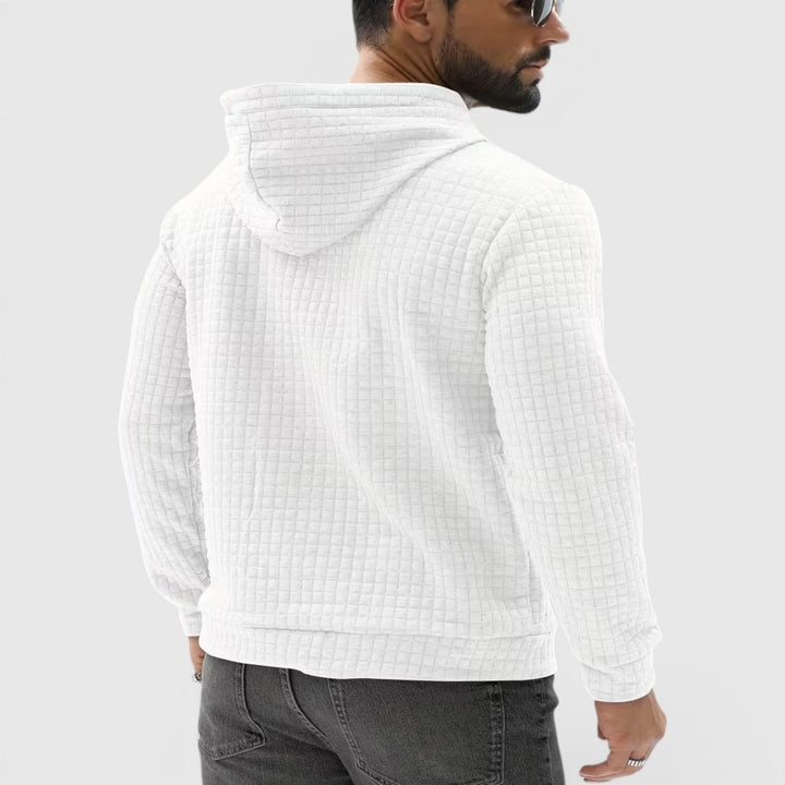 Modern men's casual hoodie, soft pullover for comfortable winter lounging.