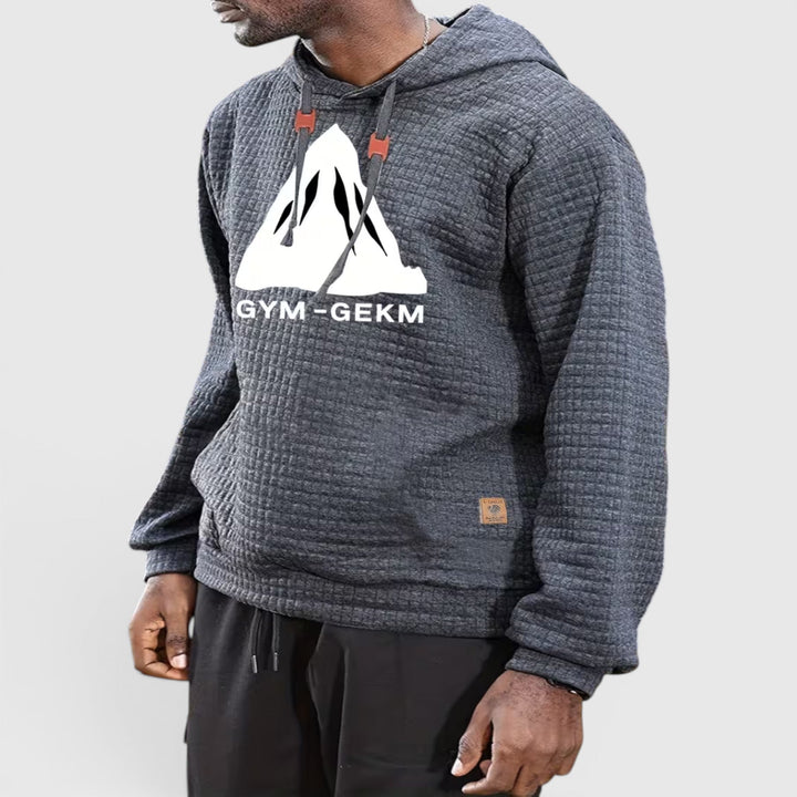 Warm men's casual pullover hoodie, ideal for comfortable winter layering.
