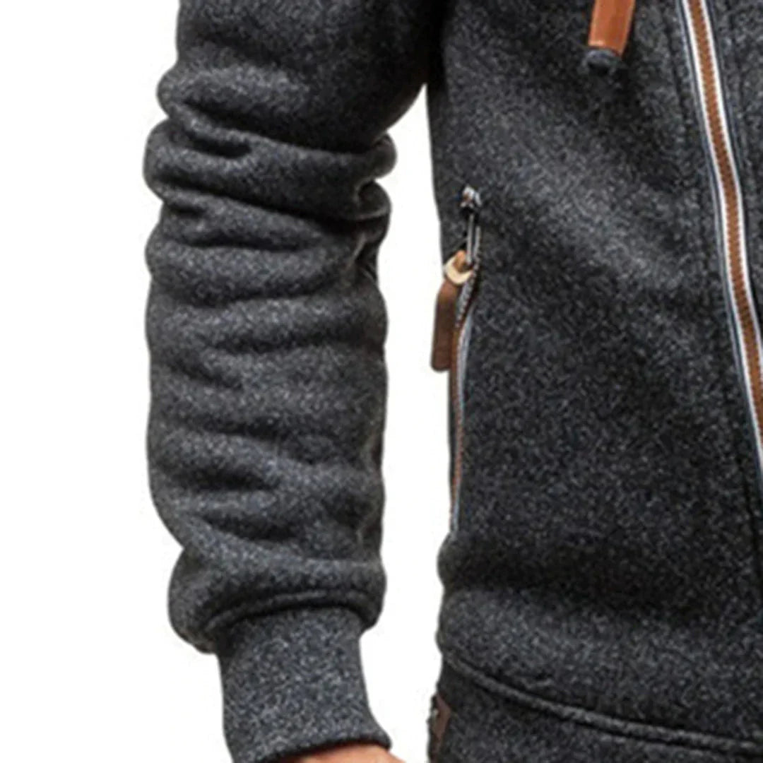 Versatile men's pullover hoodie, suitable as casual outerwear. Features cozy material and convenient front pockets.
