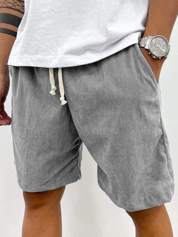 Stylish men's ribbed stretch corduroy shorts for casual spring & summer fashion, offering comfy fit.