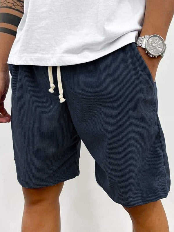Close-up of men's ribbed stretch shorts' comfy drawstring waistband, perfect for a relaxed fit.