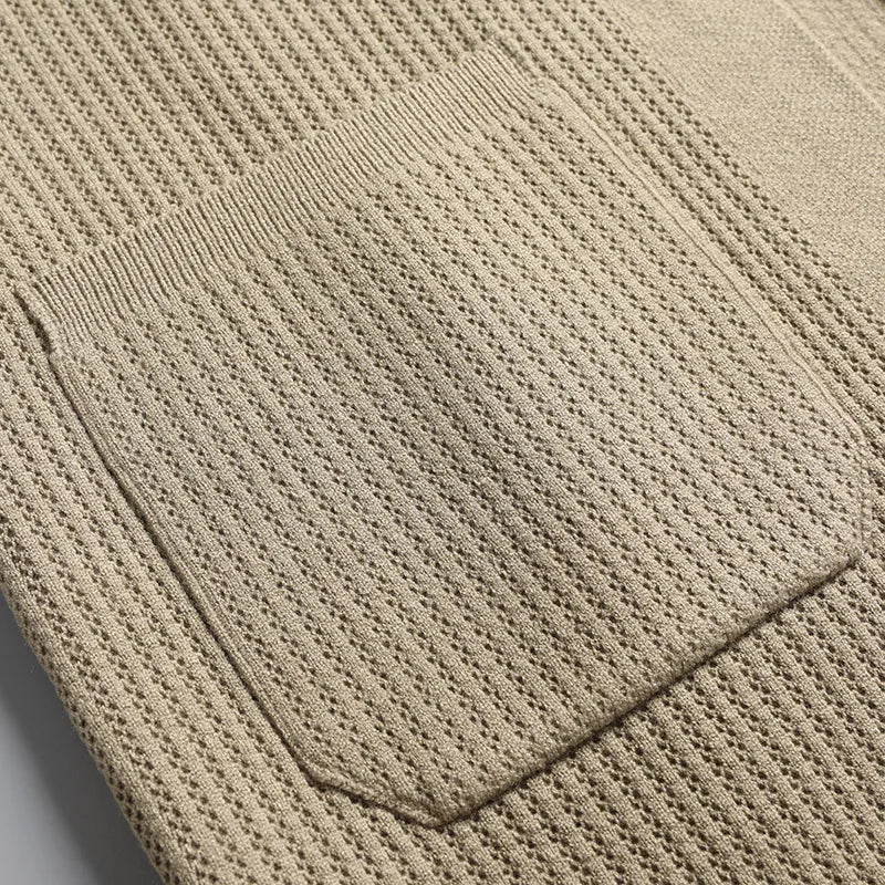 Classic men's button-front cardigan. Ribbed texture, collared neckline. Perfect for casual comfort.