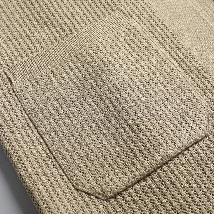 Classic men's button-front cardigan. Ribbed texture, collared neckline. Perfect for casual comfort.