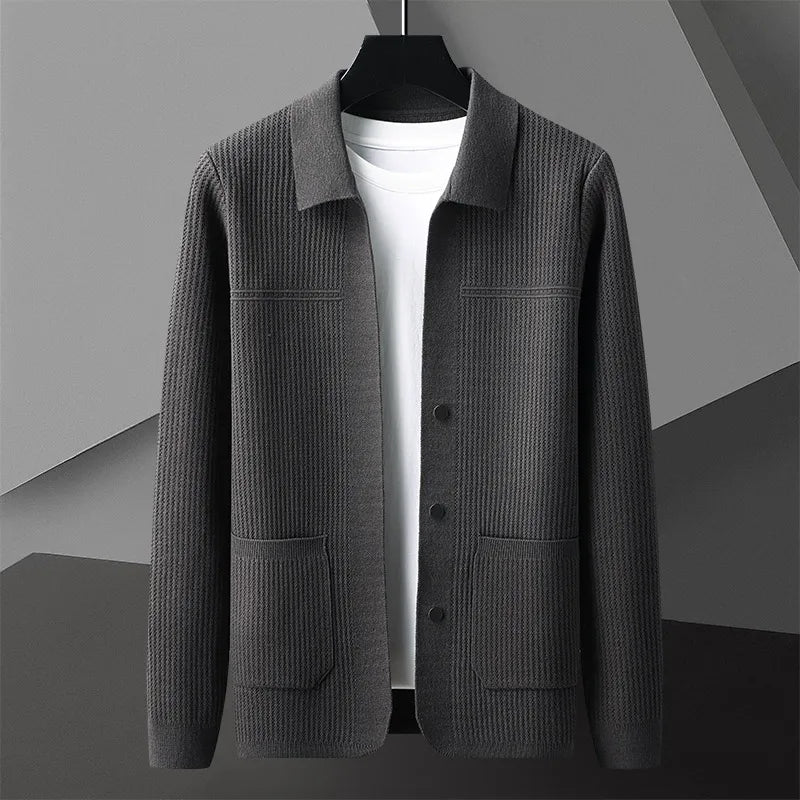 Men's knit collared cardigan with ribbed details. Button-up front, ideal for fall layering.
