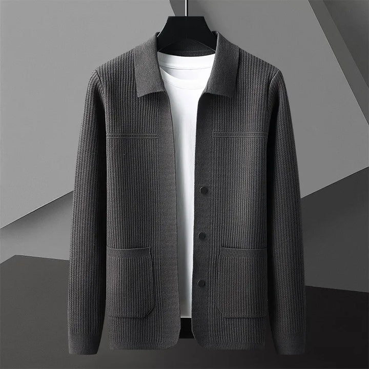 Men's knit collared cardigan with ribbed details. Button-up front, ideal for fall layering.