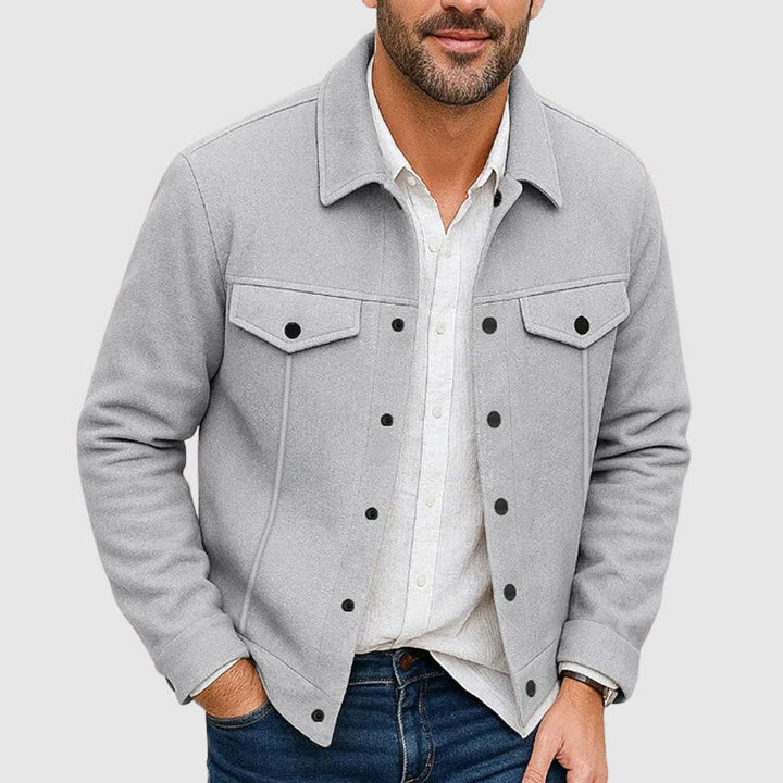 Stylish men's button-up shirt jacket. Features classic collar, dual chest pockets for a casual, regular fit.