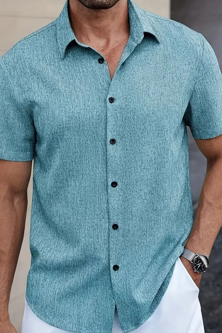 Breathable cotton men's short sleeve button down, casual summer shirt, warm weather essential. Men's top.