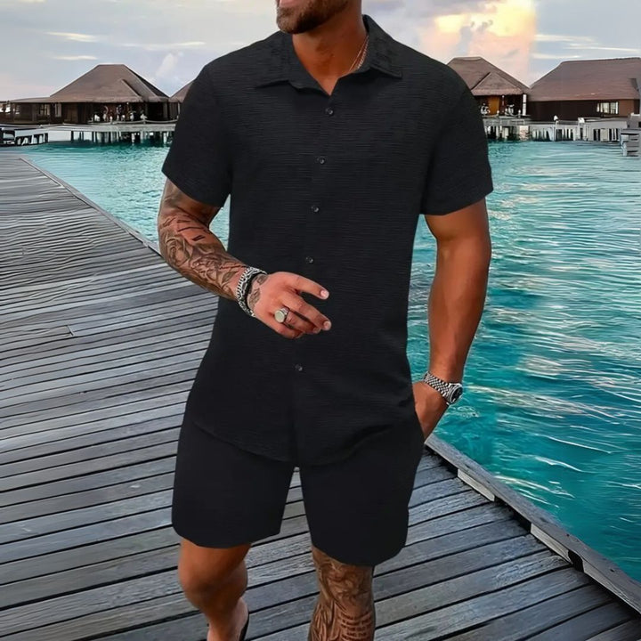 Relaxed fit men's two-piece set: short sleeve shirt & coordinating shorts for ultimate summer comfort.