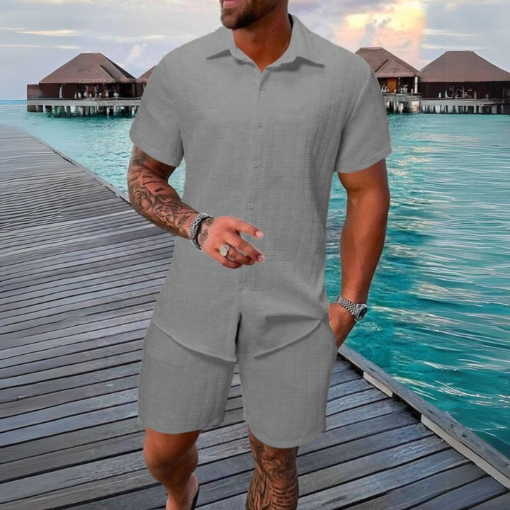 Two-piece menswear: casual short sleeve shirt and shorts set, a comfortable and stylish summer vacation outfit.