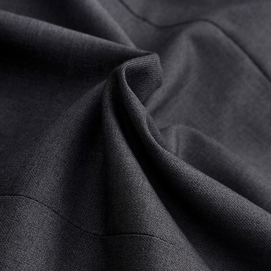 Detail of men's casual single-breasted jacket with standard fit. Classic collar and versatile everyday smart-casual style.