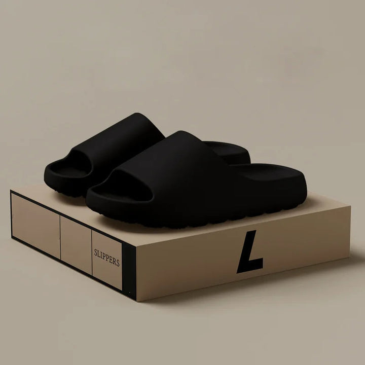 Men's casual slip-on comfort slippers for indoor & outdoor use, featuring a modern design and lightweight feel.