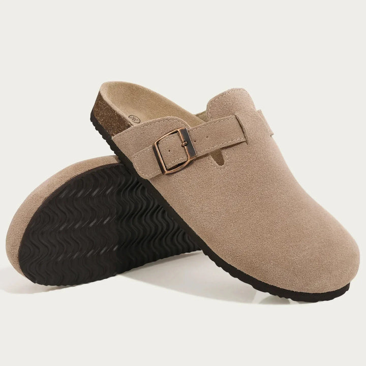 Front view of men's slip-on clog mules highlighting the elegant buckle accent.