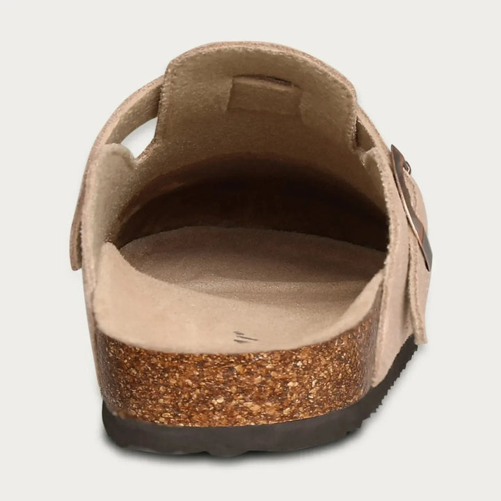 Side view of men's comfortable clog mules in rich suede material.