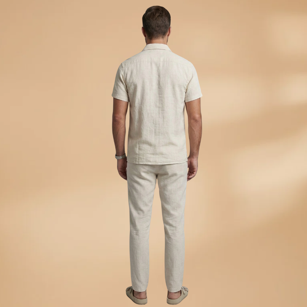 Comfortable men's two-piece summer set: short-sleeve shirt & straight-leg pants. Relaxed fit for warm weather.