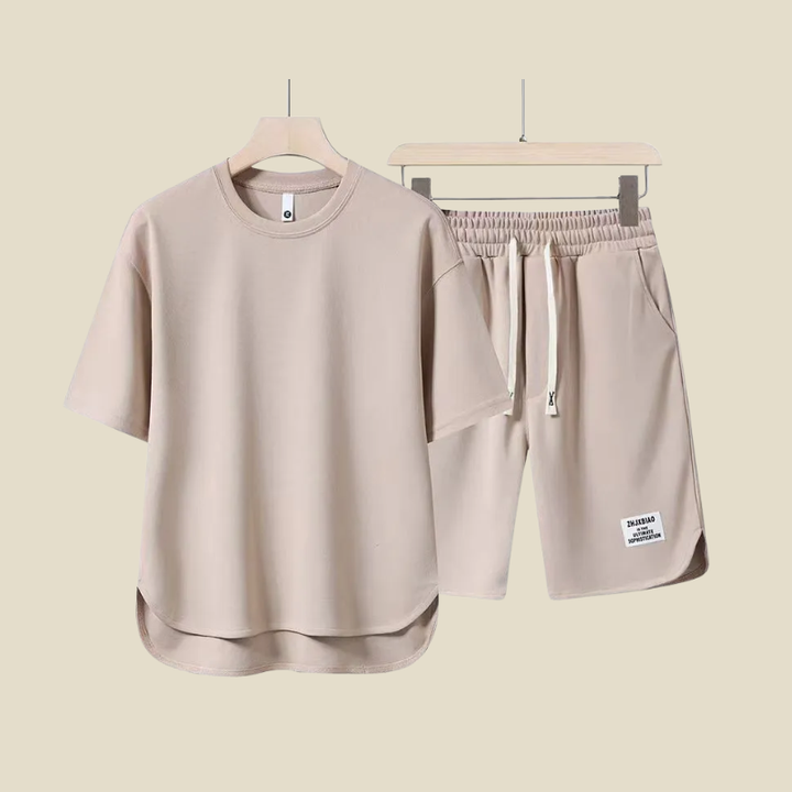 Relaxed fit men's two-piece set for summer. Comfortable short sleeve tee and drawstring shorts for holidays.