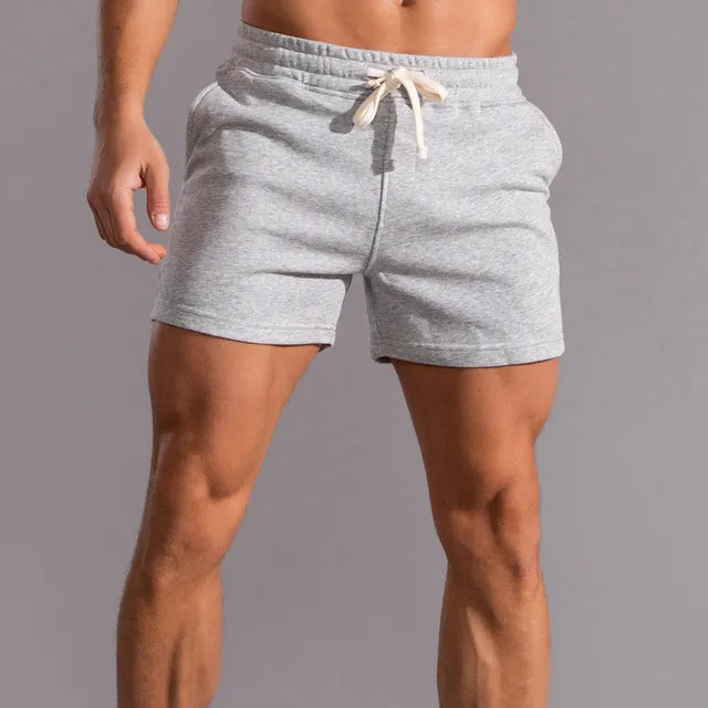 Breathable men's summer casual shorts with convenient pockets. Perfect for warm weather & stylish spring fashion.