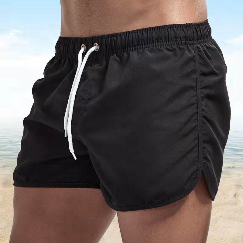 Stylish men's beachwear swim shorts with adjustable waist for summer activewear & vacation.