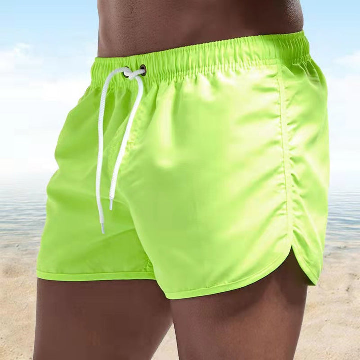 Men's versatile casual swim shorts with adjustable waistband for summer beach & activewear.