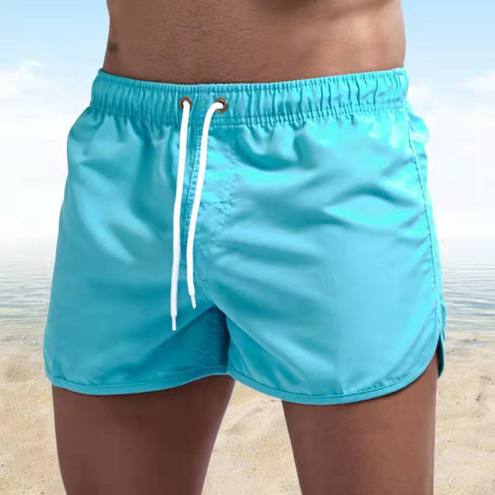 Men's quick-dry casual swim shorts with adjustable waistband, perfect for summer vacation.