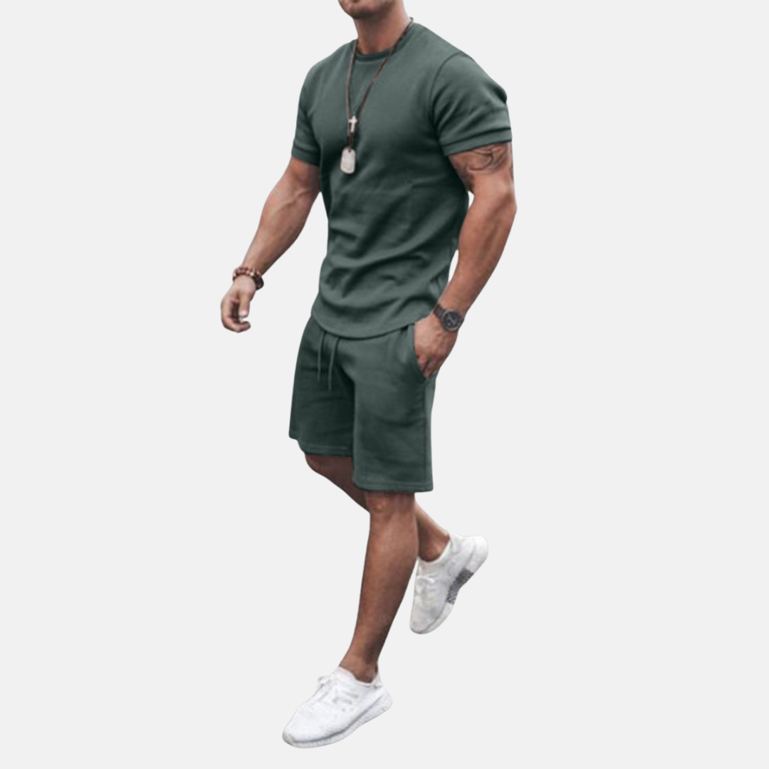 Men's fashion casual two-piece summer outfit including a short-sleeve top and matching shorts for comfort.