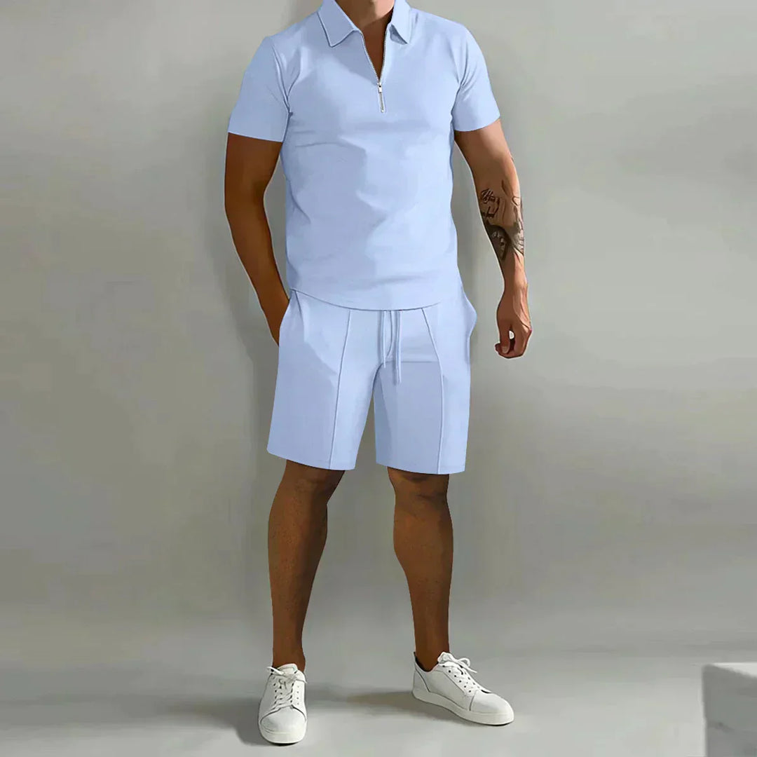 Stylish men's zip polo shirt & matching shorts, ideal casual summer outfit. Comfortable two-piece set.