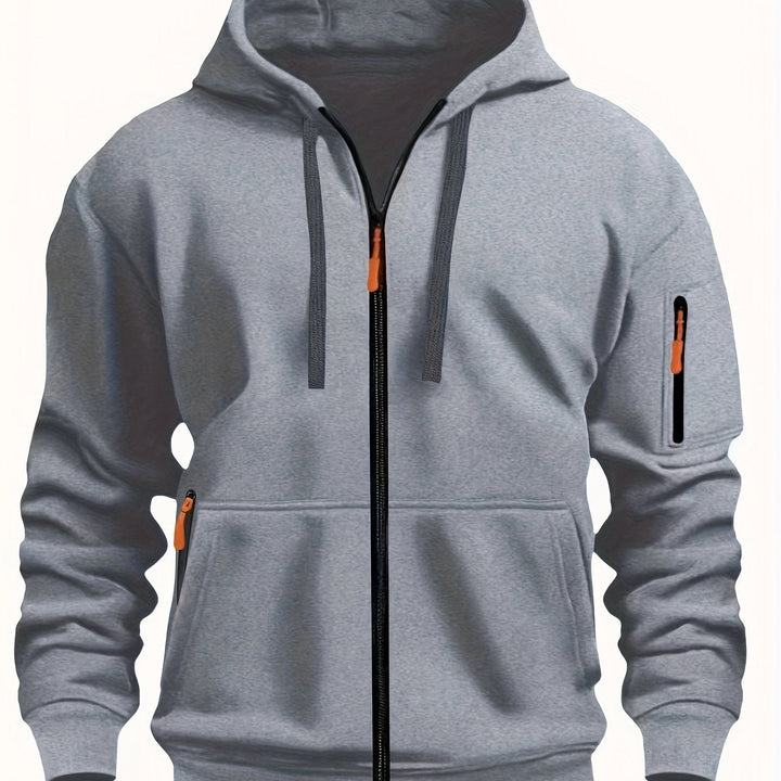 Front view of men's zip-up hoodie, highlighting pockets and fit
