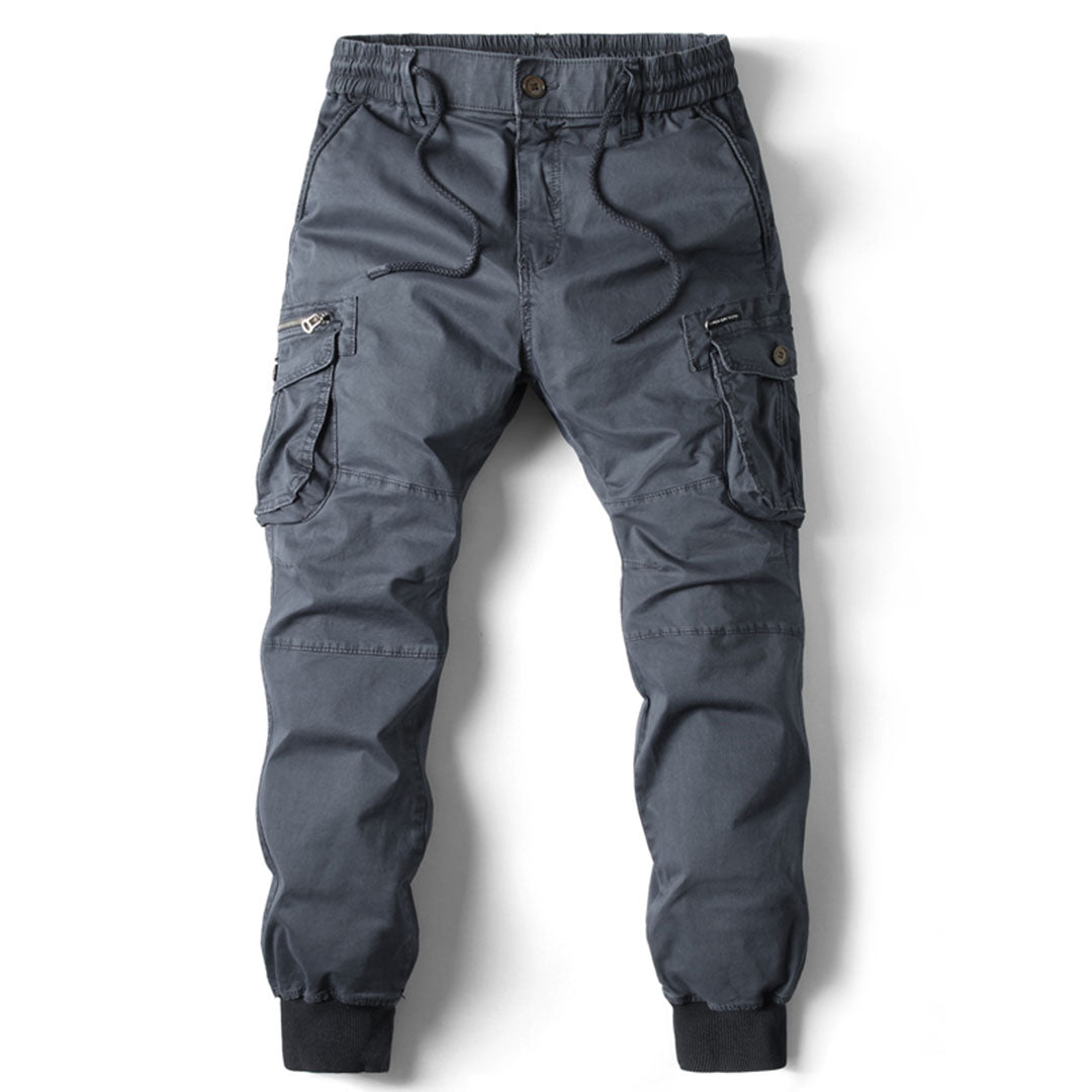 Detailed view of the deep utility pockets on men's Charlie cargo pants.